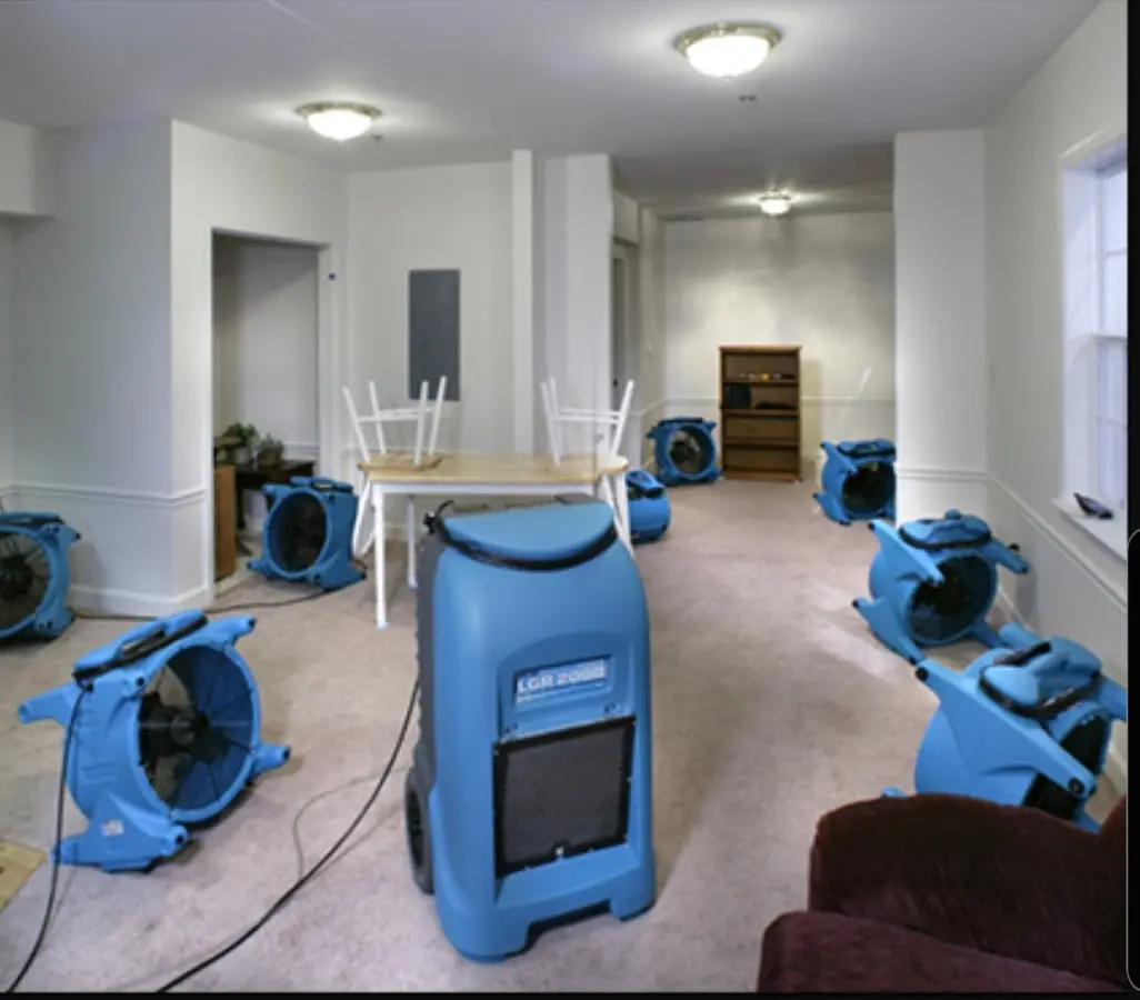Air movers and dehumidifier setup for Water Damage Restoration in East Buffalo